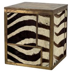 an animal print side table with two drawers