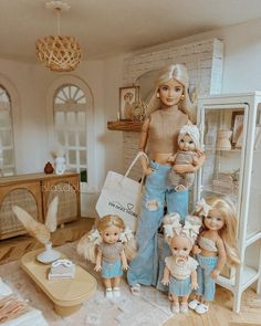 a group of dolls standing next to each other