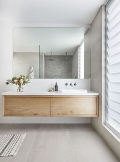 the bathroom is clean and ready to be used as a room divider or countertop