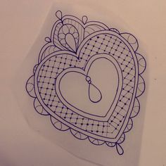 a drawing of a heart with a clock on it's side, in the shape of a doily