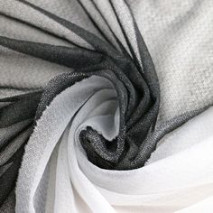 black and white fabric is shown in close up