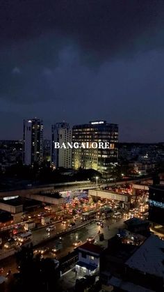 an aerial view of a city at night with the word bangkok written on it's side