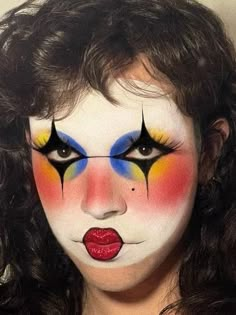 halloween clown makeup: colorful, geometric look Crazy Glam Makeup, Clown Lips Makeup Tutorial, Salina Killa Clown, Artistic Clown Makeup, Black White And Red Clown Makeup, Full Face Artistic Makeup, Abstract Clown Makeup, 70s Clown Makeup