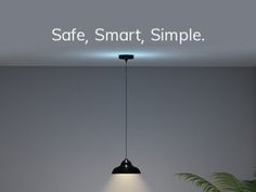 a lamp that is on in the middle of a room with a sign saying safe, smart, simple