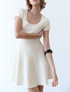 Introducing our Summer French White Skating Knitted Mini Dress – a charming and versatile addition to your warm-weather wardrobe. This dress captures the essence of French fashion with its elegant design, short sleeves, and playful knitted texture, making it perfect for summer outings and casual events.The French-inspired design brings a touch of timeless sophistication to this mini dress, while the knitted texture adds a playful and trendy element. The short sleeves make it ideal for staying cool in the summer heat, and the skating silhouette ensures a flattering fit for various body types.Crafted from high-quality knitted fabric, this mini dress guarantees both comfort and style. Whether you're enjoying a day of leisure, heading to a casual gathering, or simply strolling through the city Twist Short, French Dress, Spring Break Outfit, Early Spring Outfits, Spring Fashion Outfits, Mini Skater Dress, Y2k Outfits, Round Neck Dresses, Pleated Maxi Dress