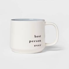 a white coffee mug with the words best person ever printed on it, sitting against a white background