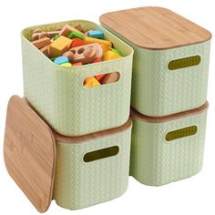 three storage bins with wooden lids and handles are stacked on top of each other