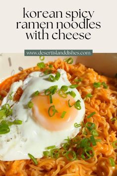 an egg on top of noodles in a bowl with text overlay that reads korean spicy ramen noodles with cheese