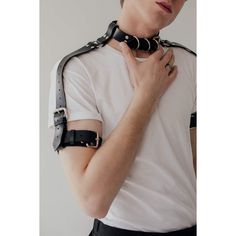 Combat style shoulder harness with detachable collar and bicep bands. It goes well with everything: over a tank top or just over your body! Four buckles, adjustable at four points on the shoulders and around the bicep. Edgy Strapped Harness With Belt, Punk Harness With Adjustable Straps, Adjustable Strapped Punk Harness, Adjustable Strapped Harness With Belt, Edgy Adjustable Harness With Belt, Adjustable Strapped Harness For Cosplay, Punk Style Black Harness With Adjustable Strap, Adjustable Black Harness With Belt, Punk Strapped Fitted Harness