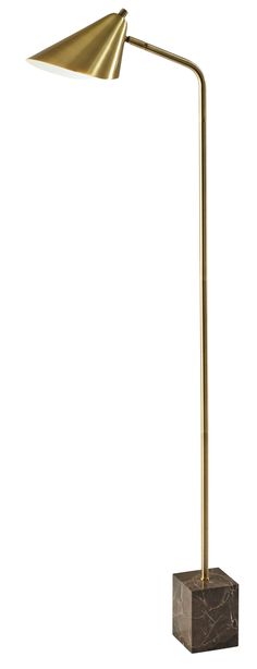 a gold colored floor lamp on a marble block with a metal base and an adjustable arm