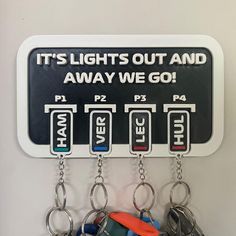 Driver name keyrings and Key Holder that are made to look like radio messages ! A cool addition to any household to show your support for your favourite drivers or team.  Each Set comes with : 1x Wall Holder,  4x Keyrings of any drivers of your choice or custom depending on your bundle 2x strips of Wall Mountable tape. Custom Tags are also available for purchase with this product for everyone in your household! Disclaimer: As this is a 3D printed product there may be small defects present due to Name Keyrings, Wall Holder, F1 Formula, Moon Moon, Room Stuff, I Cord, Pt Cruiser, Fortune Teller, Smart Car