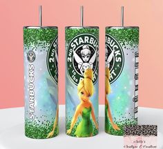 two starbucks cups with tinkerbells on them