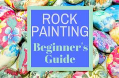 rocks with the words rock painting beginner's guide on top and bottom in blue