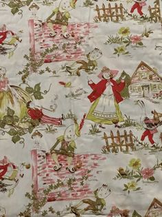 an old fashioned fabric with children's pictures on it