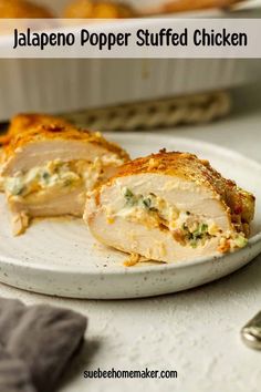 a white plate topped with sliced chicken covered in cheese and broccoli next to a serving dish