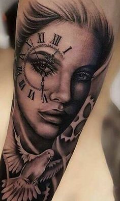 a woman's arm with a clock and bird on it