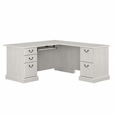 an l shaped desk with three drawers and two doors on the front, in white