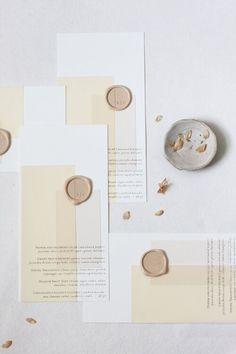 some buttons and papers on a table