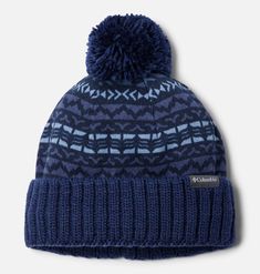 a blue hat with a pom - pom