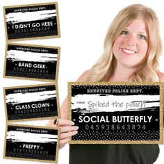 a woman holding up three business cards with the words social butterfly printed on one side