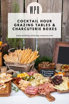 a table full of different types of cheeses and crackers with text overlay that reads, wpr cocktail hour grazing tables & charcuterie boxes