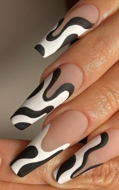 Check out these 30 chic black and white nail designs that make a statement! From french tips to geometric patterns, there's something for you. Whether you prefer gel, acrylic, or natural nails in short square, almond, or coffin shapes - we've got ideas for you. Discover the timeless beauty of black and white nails with simple yet cute designs that are sure to elevate your aesthetic. Find your perfect black and white nail inspo here! Plus: that girl nails, glow up nails, nails 2024 Black Abstract French Nails, Black And White Nails Coffin, Black And White Nails Square, Black And White Swirl Nails, Black French Tip Nail Designs, White Nail Inspo, Emo Nails, Nail Black