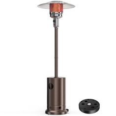 an outdoor patio heater next to a black object