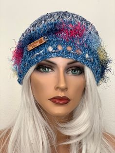 I Designed and Hand Knitted this Cotton Slouch, Hat, Beanie , Beret, Tam. Top gather pull style braided tie, allows you to open as needed to get pony tail / hair out. Bottom of the hat has a braided tie with different beads on ends, going through and allows adjustable fit.  Multicolors of spring & summer colors in novelty yarn around the bottom. Designed and Hand Knitted in California, USA. See All of My Original Designs Four Seasons Trendy Fine Hand Knits listed in My Etsy Shop:  " Hand Knits 2 Love":  Etsy.com/shop/handknits2love Casual Beanie For Festivals, Blue Knit Beanie Hat, Blue One-size Spring Crochet Hat, Blue Fitted Casual Beanie, Blue Knit Beanie Cap, Blue Knitted Beach Hat, Spring Festival Blue Crochet Hat, Blue Adjustable Bohemian Crochet Hat, Adjustable Bohemian Crochet Hat In Blue