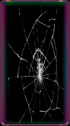 a broken glass window with the light reflecting off it's side and black background