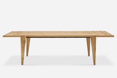 a wooden table with two legs and a rectangular top, against a white background the table is made out of wood