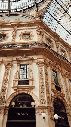 the inside of a large building with many windows