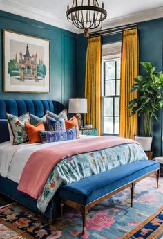 a bedroom with blue walls and colorful bedding