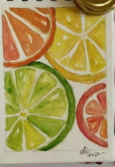 a drawing of oranges, lemons and limes on a piece of paper