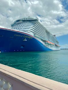 a large cruise ship docked in the water