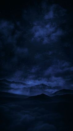 the night sky is full of stars and clouds, as well as some dark blue hues