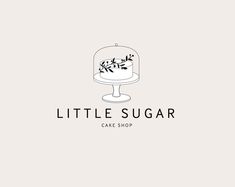 the little sugar cake shop logo is designed to look like it has been decorated with flowers