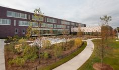 an aerial view of a building and walkway