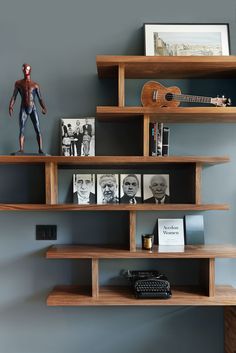 shelves with books, figurines and pictures on them