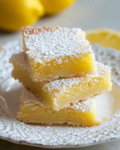 three pieces of lemon cake on a white plate