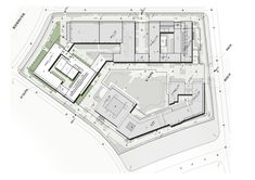 an aerial view of the ground plan for a building with multiple floors and lots of windows