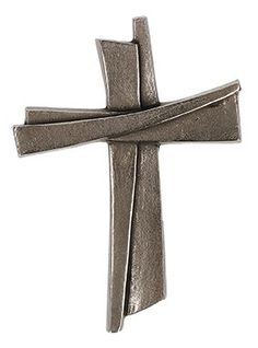 a metal cross on a white background