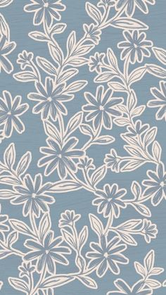 a blue and white wallpaper with flowers on it