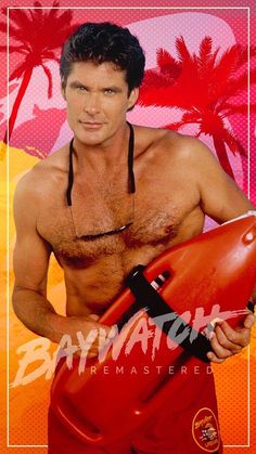 a shirtless man holding a life preserver in front of a palm tree background