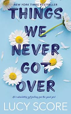 a book cover with daisies and the words, things we never got over