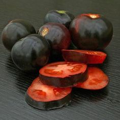 some sliced up tomatoes sitting on top of a table