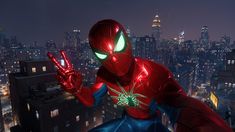 the amazing spider - man is standing in front of a cityscape at night