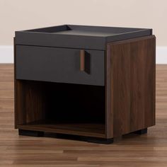 the side table is made from wood and has an open drawer on one side, with a door at the top