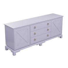 a white dresser with gold handles and drawers