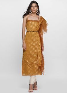 Pull together a chic look with this mustard silk foil printed straight cut dress. It has straps with pearl edging and is paired with ivory dupion pencil trousers. A mustard organza frill dupatta is added to complete the look. Frill Dupatta, Straight Cut Dress, Pencil Trousers, Cut Dress, Kurta Set, Trouser Suits, Foil Print