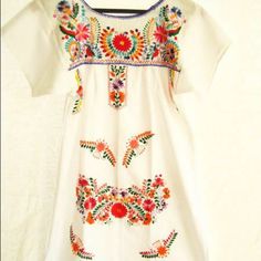 Mexican Dress Embroidered Off White (Cream) Ethnic Chic Bohemian Folk A Beautiful Dress In Mexican Embroidery Featured In Poshmark Nwt!! Love Ready To Ship, If You Need It Custom Made In A Size Color Not Listed Let Me Know I Will Be Here! Poshmark @Aidacoronado Mexican Dress Photo Pinterest Actress Selma Blair Wearing A Traditional Mexican Dress I Will Be Here, Traditional Mexican Dress, Mexican Embroidered Dress, Photo Pinterest, Bohemian Tunics, Short Faux Fur Jacket, Selma Blair, Mexican Embroidery, Ethnic Chic